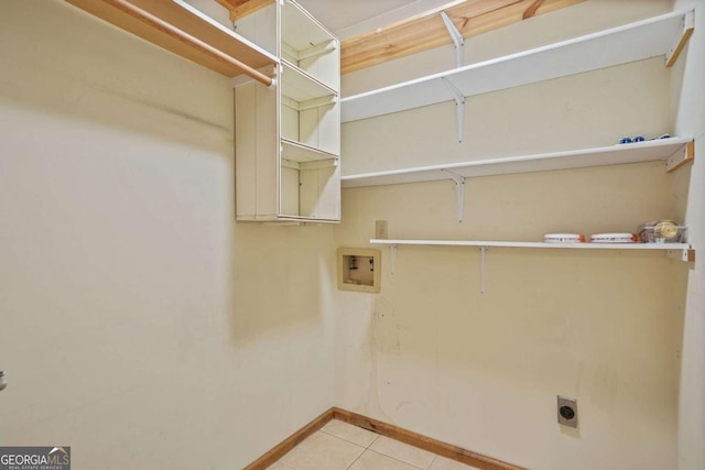 4211 Burnt Hickory Rd NW, Marietta, GA 30064 - laundry room with hookup for a washing machine, hookup for an electric dryer, and tile patterned flooring