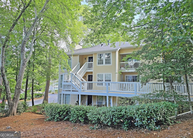 1202 Countryside Pl SE, Smyrna, GA 30080 - rear view of house with a balcony and stairway