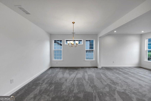612 Michigan Cir, Hoschton, GA 30548 - unfurnished dining area featuring a chandelier, carpet flooring, and recessed lighting