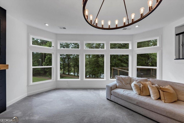 612 Michigan Cir, Hoschton, GA 30548 - living area with carpet, recessed lighting, and a chandelier