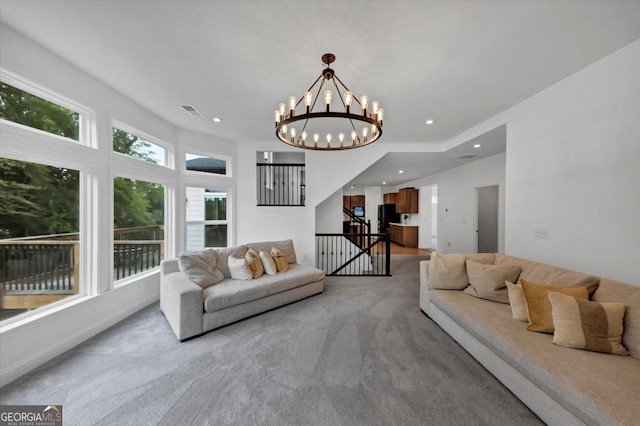 612 Michigan Cir, Hoschton, GA 30548 - living room with light carpet, a chandelier, and recessed lighting