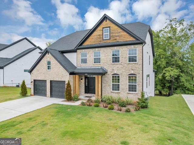 612 Michigan Cir, Hoschton, GA 30548 - view of front of house featuring brick siding, driveway, a front yard, and an attached garage