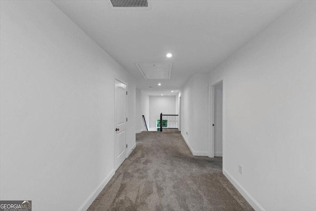 612 Michigan Cir, Hoschton, GA 30548 - hallway featuring attic access, recessed lighting, carpet flooring, and an upstairs landing