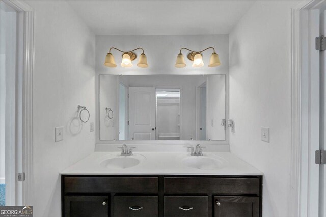 612 Michigan Cir, Hoschton, GA 30548 - bathroom with double vanity