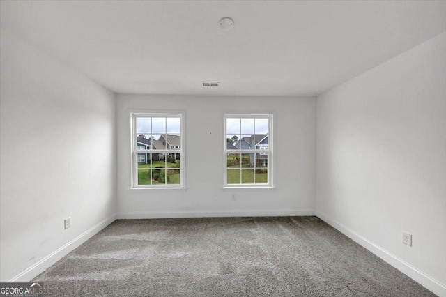 612 Michigan Cir, Hoschton, GA 30548 - empty room featuring carpet flooring