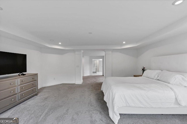 612 Michigan Cir, Hoschton, GA 30548 - carpeted bedroom with a raised ceiling and recessed lighting