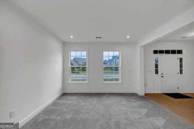 612 Michigan Cir, Hoschton, GA 30548 - foyer with carpet floors and recessed lighting