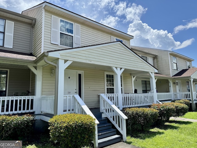 912 Pineland Ave Apt 50, Hinesville, GA 31313 - view of front of house featuring covered porch