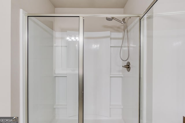 6841 Lancaster Xing, Flowery Branch, GA 30542 - bathroom featuring a stall shower