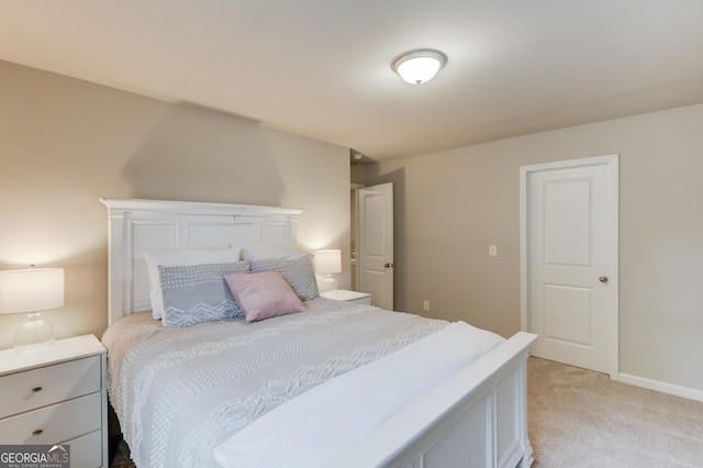 6841 Lancaster Xing, Flowery Branch, GA 30542 - bedroom featuring light colored carpet and baseboards