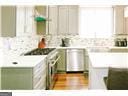 1 Egrets Landing Ct, Savannah, GA 31419 - kitchen with green cabinets and light countertops
