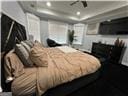 1 Egrets Landing Ct, Savannah, GA 31419 - bedroom featuring recessed lighting and a fireplace