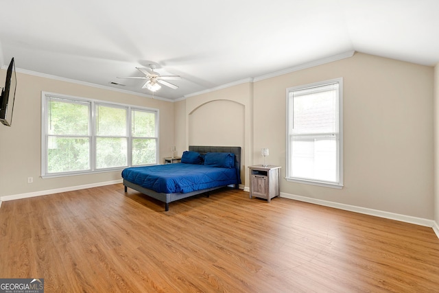 733 Miller Run, Atlanta, GA 30349 - bedroom featuring light wood finished floors, a ceiling fan, lofted ceiling, and ornamental molding