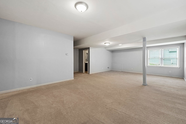 733 Miller Run, Atlanta, GA 30349 - below grade area with light carpet and baseboards