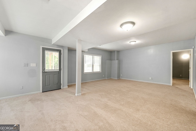 733 Miller Run, Atlanta, GA 30349 - below grade area with light colored carpet and baseboards
