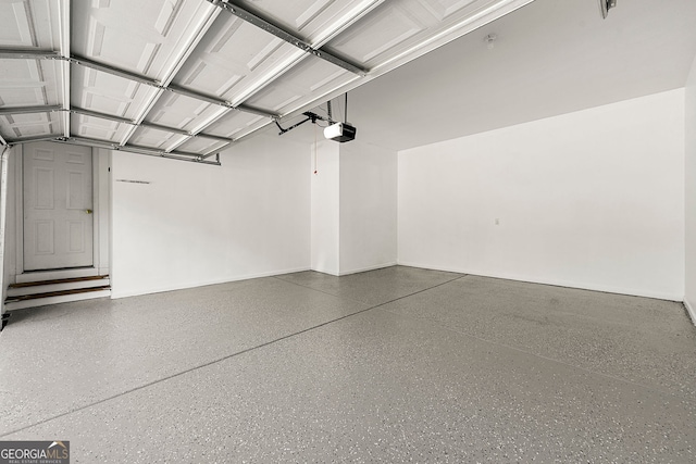 733 Miller Run, Atlanta, GA 30349 - garage featuring a garage door opener