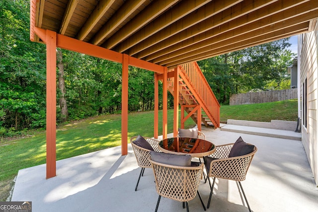 733 Miller Run, Atlanta, GA 30349 - view of patio / terrace with stairway and outdoor dining area
