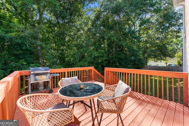 733 Miller Run, Atlanta, GA 30349 - wooden deck featuring outdoor dining area and area for grilling