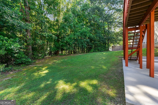 733 Miller Run, Atlanta, GA 30349 - view of green lawn featuring stairway