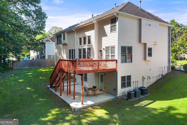733 Miller Run, Atlanta, GA 30349 - rear view of property featuring stairway, a deck, and a patio