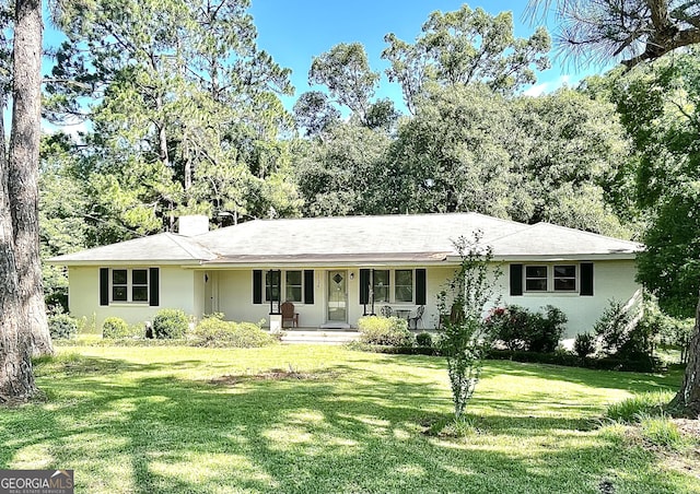 1794 Dames Ferry Rd, Forsyth, GA 31029 - single story home featuring covered porch, a front yard, and a chimney