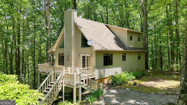1203 Spring Cove Rd, Blairsville, GA 30512 - rear view of house featuring stairway, a shingled roof, a deck, and a chimney
