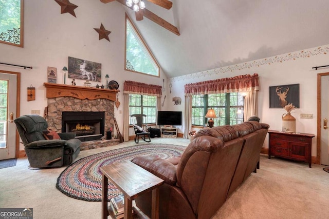 1203 Spring Cove Rd, Blairsville, GA 30512 - living area with high vaulted ceiling, light carpet, a fireplace, and a ceiling fan