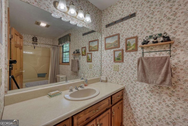 1203 Spring Cove Rd, Blairsville, GA 30512 - full bathroom with vanity, shower / tub combo, and wallpapered walls