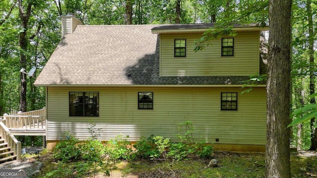 1203 Spring Cove Rd, Blairsville, GA 30512 - view of home's exterior featuring a shingled roof, a chimney, a wooden deck, and stairs