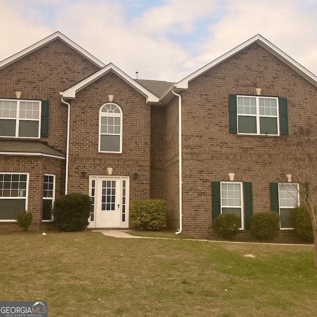 1951 Pleasant Walk, Lithonia, GA 30058 - view of front of home featuring brick siding and a front yard