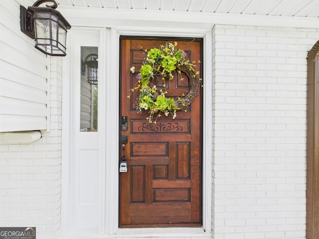 6417 Carey Pl, Macon, GA 31216 - doorway to property featuring brick siding