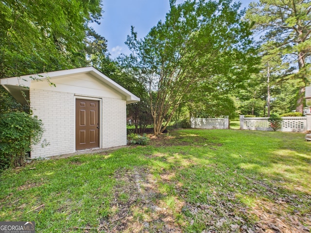 6417 Carey Pl, Macon, GA 31216 - view of yard with a storage unit