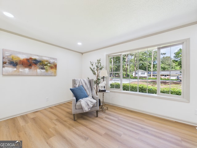 6417 Carey Pl, Macon, GA 31216 - sitting room featuring wood finished floors, ornamental molding, and recessed lighting