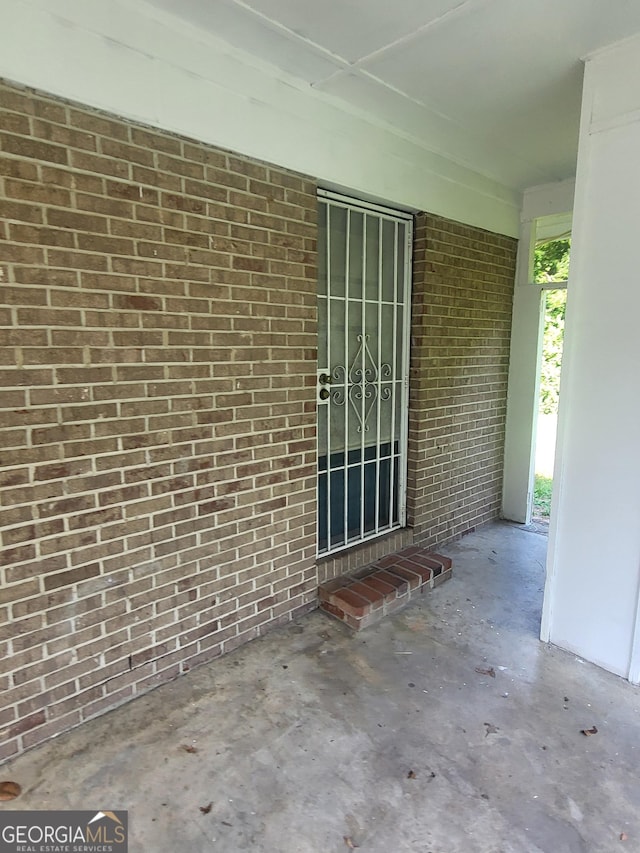 4274 W Oak Dr, Macon, GA 31210 - view of exterior entry featuring brick siding