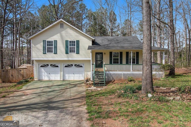 48 Glenhaven Ct, Douglasville, GA 30134 - split level home with a porch, driveway, and a garage