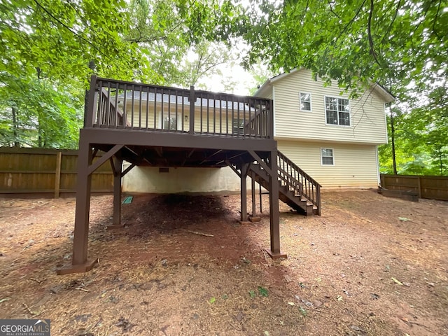 48 Glenhaven Ct, Douglasville, GA 30134 - rear view of property featuring a wooden deck and stairs
