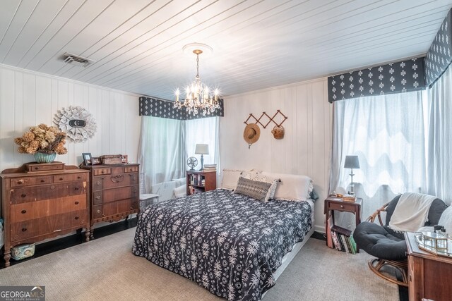 8815 Campbellton St, Douglasville, GA 30134 - carpeted bedroom with a chandelier and wooden ceiling