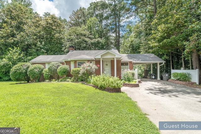 8815 Campbellton St, Douglasville, GA 30134 - single story home featuring asphalt driveway, brick siding, a carport, and a chimney