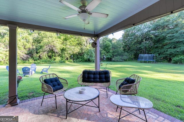 8815 Campbellton St, Douglasville, GA 30134 - view of patio featuring a trampoline, view of scattered trees, and ceiling fan