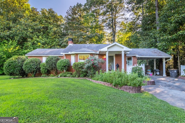 8815 Campbellton St, Douglasville, GA 30134 - ranch-style home with a carport, asphalt driveway, a front lawn, and brick siding