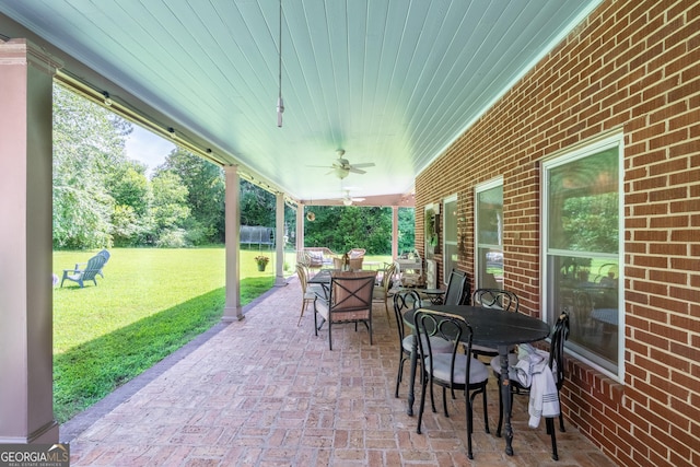 8815 Campbellton St, Douglasville, GA 30134 - view of patio featuring outdoor dining area and a ceiling fan