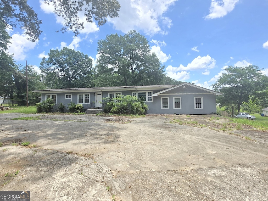 4945 Campbellton, Atlanta, GA 30331 - view of front of property with stucco siding and driveway
