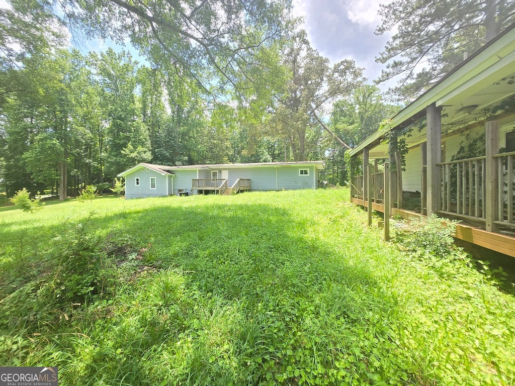 4945 Campbellton, Atlanta, GA 30331 - view of green lawn featuring a wooden deck