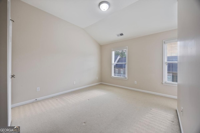 4742 Legacy Cove Ln, Smyrna, GA 30126 - empty room with carpet floors and lofted ceiling