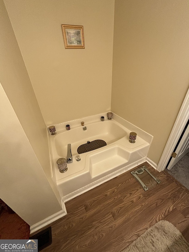 110 Waverly Way, Lagrange, GA 30240 - full bath featuring a bath and wood finished floors