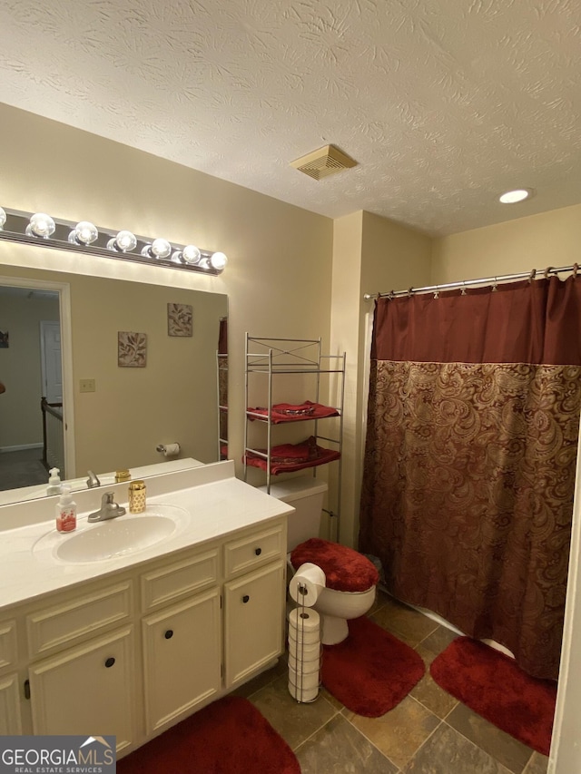 110 Waverly Way, Lagrange, GA 30240 - bathroom featuring vanity, tile patterned floors, a textured ceiling, and a shower with curtain