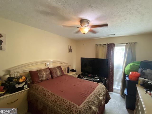 110 Waverly Way, Lagrange, GA 30240 - bedroom with carpet flooring, ceiling fan, and a textured ceiling
