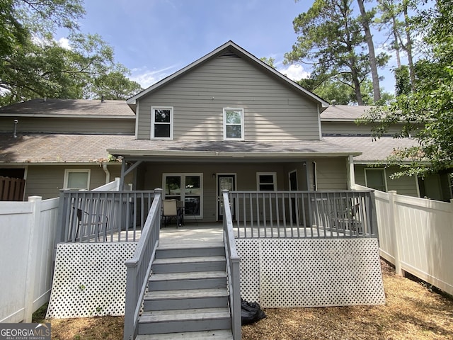 110 Waverly Way, Lagrange, GA 30240 - rear view of house with a shingled roof and stairs
