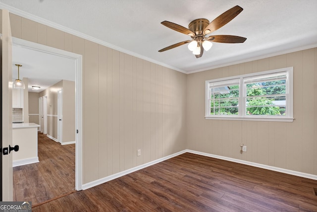116 Preston Pl, Lagrange, GA 30241 - unfurnished room with dark wood finished floors, a ceiling fan, and crown molding