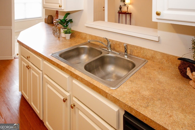 555 Flintlock Dr, Dacula, GA 30019 - kitchen with light countertops, wood finished floors, and white cabinets
